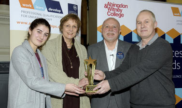 Manager Bob Malloy, and apprentice Jordan Morris from the print studio accepting their award from Clive Shepherd and the registrar Gill Aitken at the 2019 University Apprenticeship awards